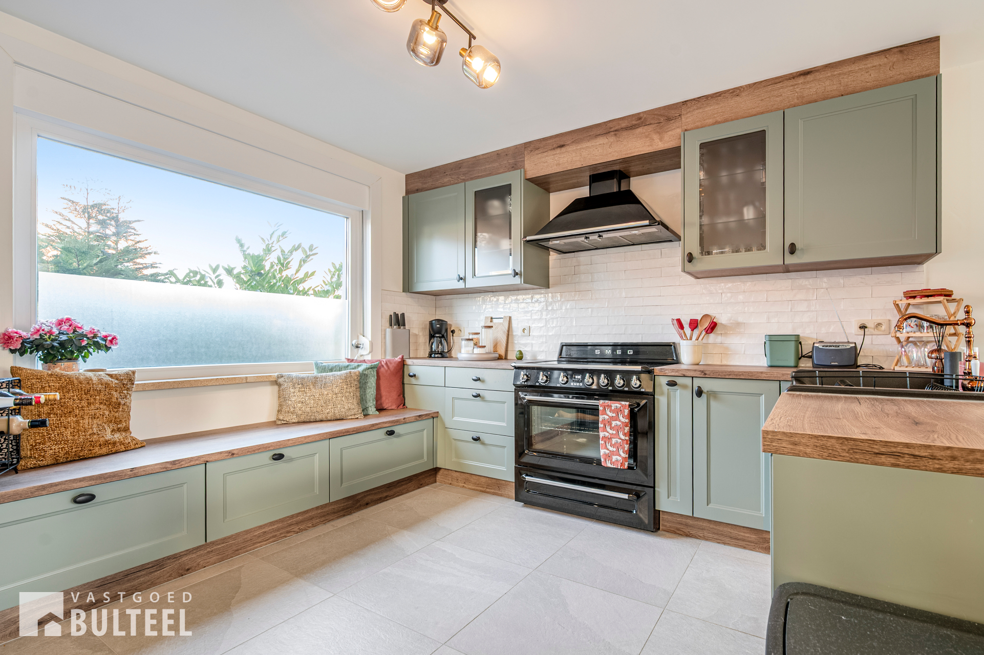 Gerenoveerde half open bebouwing met 3 slaapkamers en tuin. - foto 4