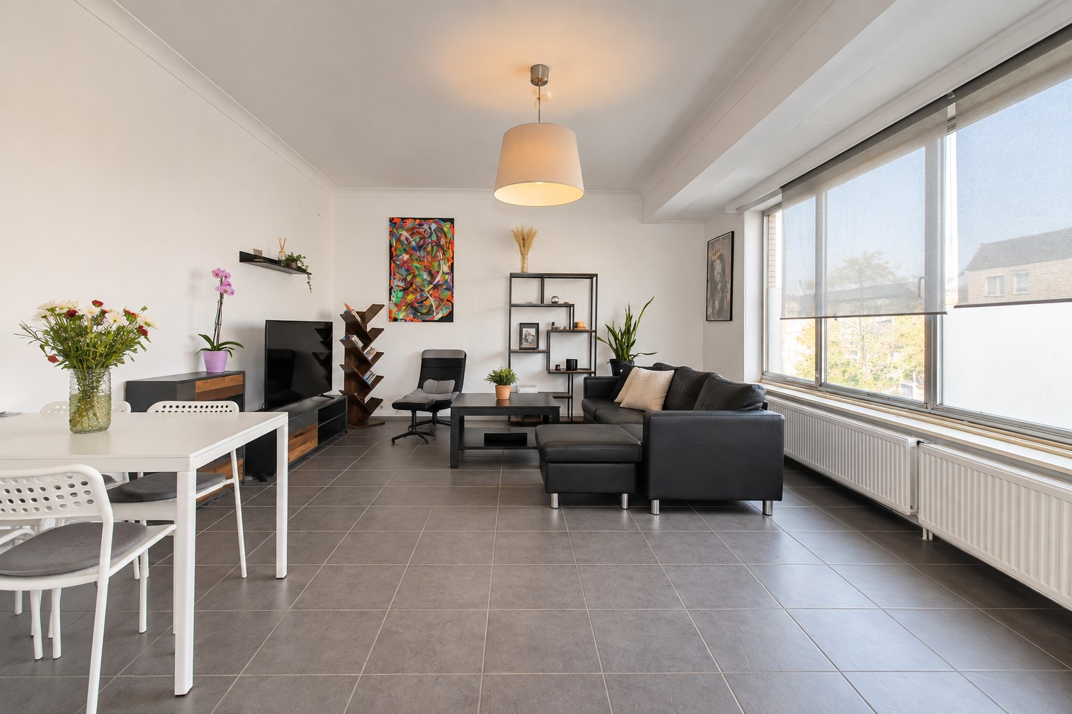 Te koop: Lichtrijk en instapklaar 2-slaapkamerappartement met terras en EPC-label C op gunstige ligging in Sint-Niklaas! - foto 4
