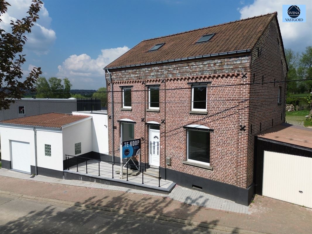 ZEER RUIME WONING MET 4 SLAAPKAMERS EN 2 GARAGES - foto 1