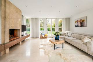 This stylish, spacious villa exudes class and sophistication from the moment you enter the green driveway. Located in a quiet residential...