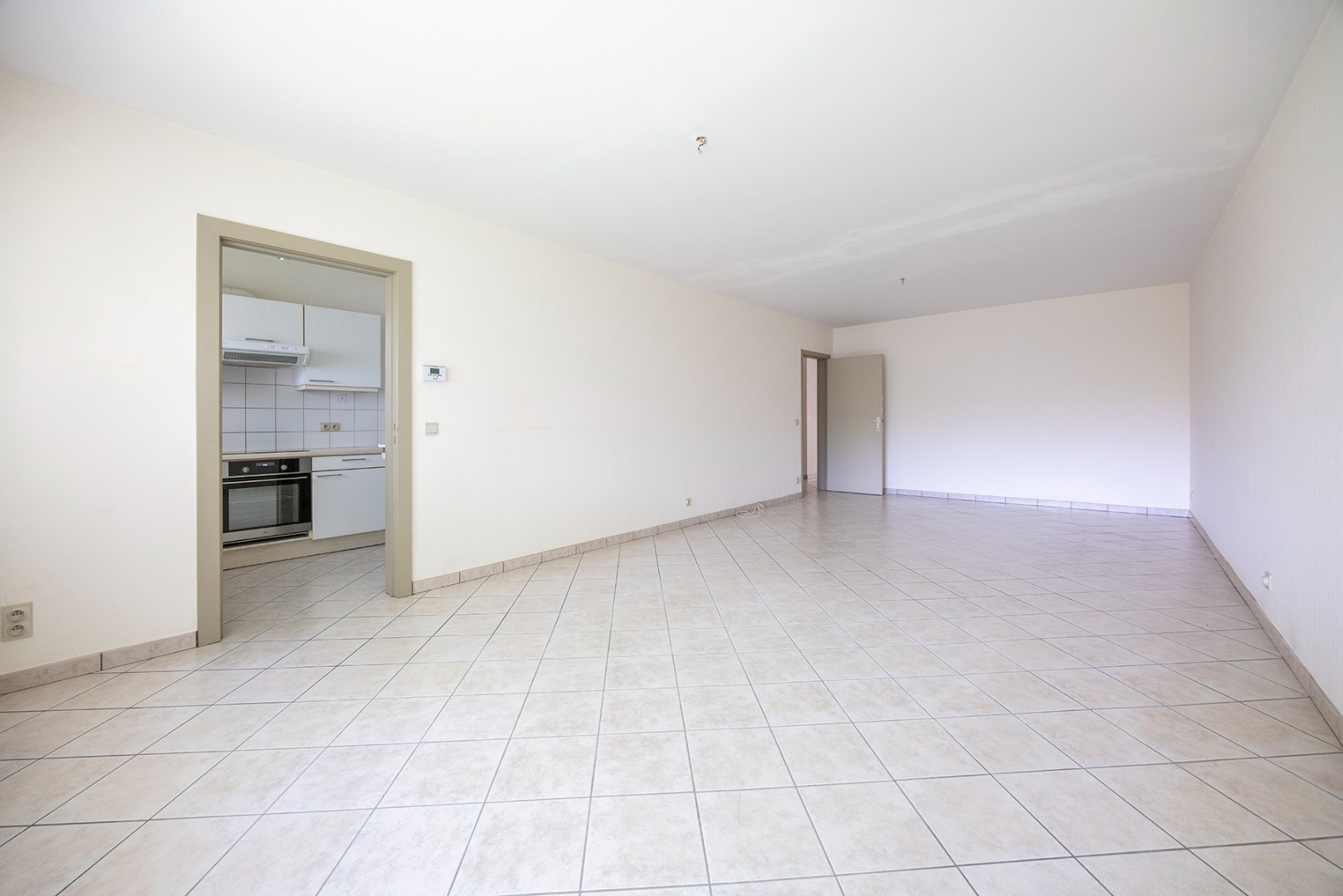 Gelijkvloers appartement met 3 slaapkamers en tuin - foto 4