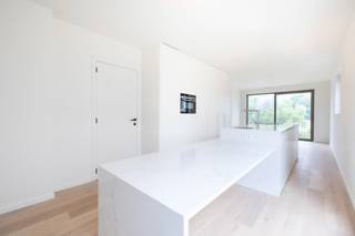 BERCHEM-SAINTE-AGATHE, gelegen in een residentiële wijk op de 1e verdieping van een elegant nieuwbouwproject dat deel uitmaakt van het project...