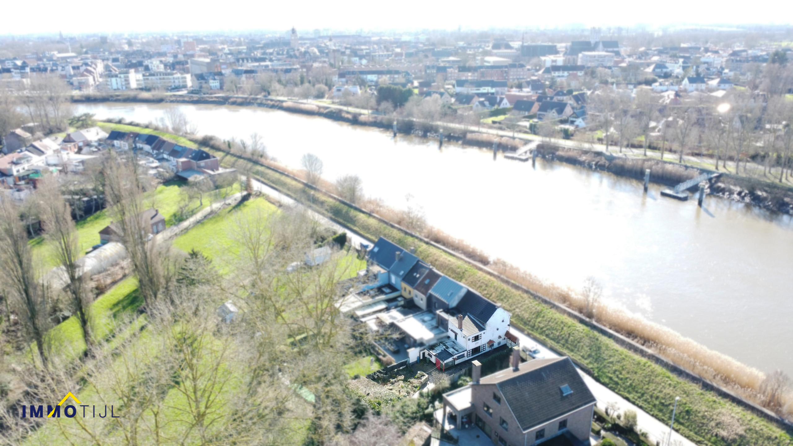 Te renoveren woning langsheen de Schelde in Grembergen. - foto 2