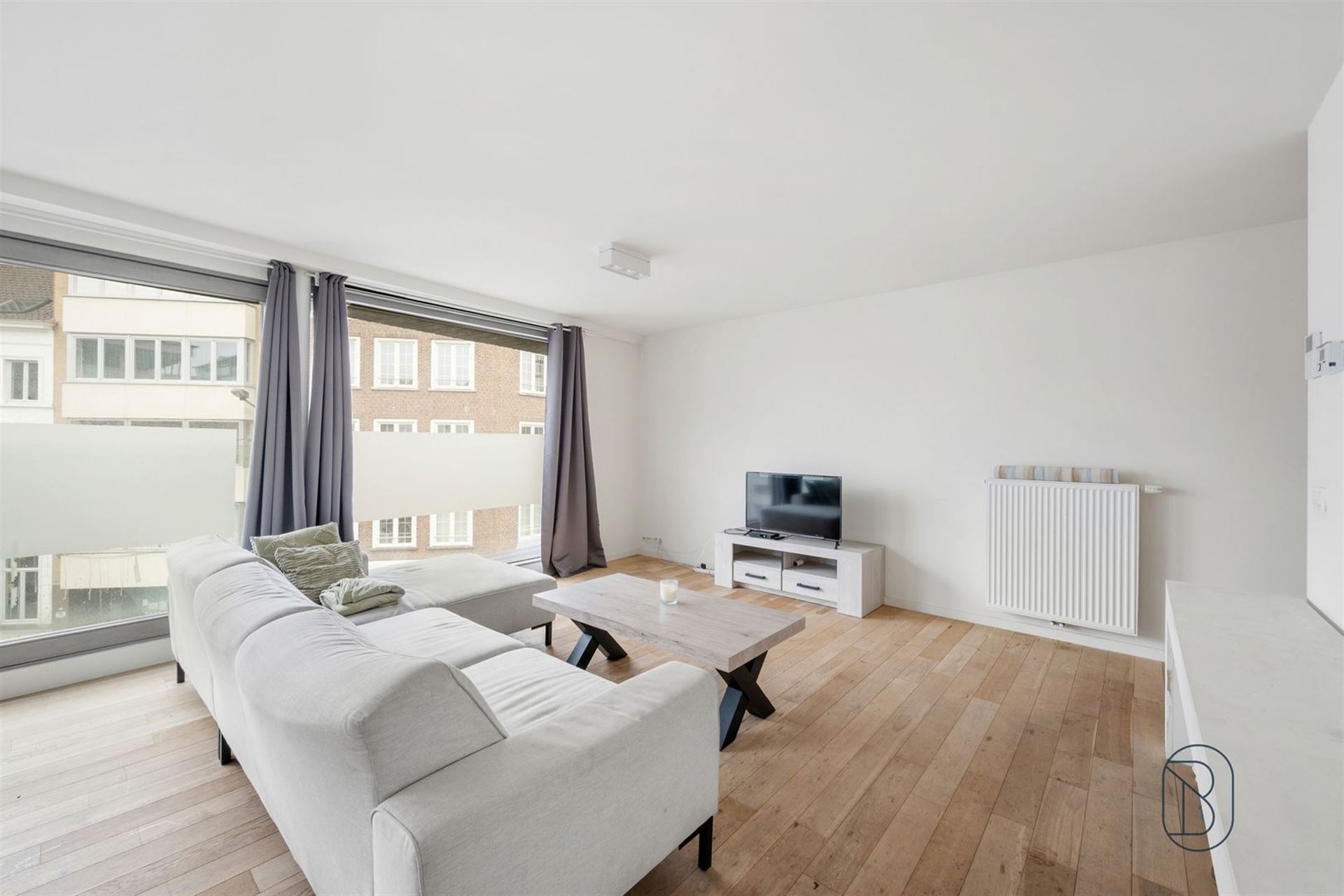 Kwalitatief 2-slaapkamerappartement met terras in Kortrijk - foto 5