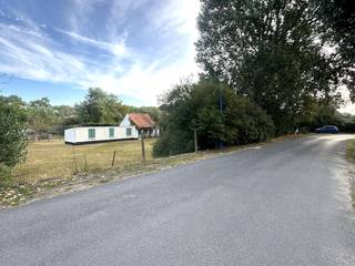 Beautiful plot of land for sale of 665m² in a small plot of 2 lots. <br />The second lot of 732m² can possibly be purchased together, bringing the total size to 1397m²!<br /><br />The lots are located along the Helvetiastraat in Koksijde-Dorp, near the dunes, within walking distance of the village center and only 1.6 km from the sea!<br /><br />Currently, there is still a house that can be demolished on the plot. As a result, the possibility of accruing 6% VAT can still be discussed. <br /><br />Interested in these land (s) for sale? Do not hesitate to contact the file manager Sarah Velle at 0470 10 52 78 or sarah.velle@dewaele.com. <br /><br />Register of measures: no