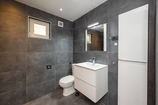 <p><span> </span></p><p><span>Living in the city without sacrificing space? With four bedrooms, two bathrooms, a large open kitchen and a city courtyard, you have a surprising amount of space in this home. Convenient for the less mobile: the house has an elevator and is fully adapted for the disabled.</span></p><p><span> </span></p><p><span>The well-kept entrance hall leads through an automatic sliding door into the living room. The wall-to-wall windows here provide lots of light, the white decorative fireplace for charm. The dining room is located behind the living room and has the same black and white tiles. Additional natural light enters through the glass dome.</span></p><p><span> </span></p><p><span>The open kitchen is fully equipped with a 5-burner gas stove, range hood, dishwasher, double sink, two combination ovens, a hot air oven, steam oven and a spacious fridge-freezer.</span></p><p><span>The kitchen also has a skylight. It opens onto the city courtyard, a pleasant outdoor space with a large tree with beautiful green foliage. This gives you natural shade in summer.</span></p><p><span> </span></p><p><span>Also on the ground floor: a first bathroom with walk-in shower, toilet, hand-washer, and a window for light and natural ventilation.</span></p><p><span> </span></p><p><span>Four full bedrooms</span></p><p><span> </span></p><p><span>On the first mezzanine floor you will find the second, particularly spacious bathroom. It has a large bathtub, a double sink, a toilet and beautiful, plain tiles on the floor and on the wall.</span></p><p><span> </span></p><p><span>For those who cannot climb the stairs on their own: the house has an elevator between the living room, the bathroom on the mezzanine floor and a bedroom on the second floor.</span></p><p><span> </span></p><p><span>The home has a total of four bedrooms, two on each of the upper floors. All of which are finished with laminate flooring. Thanks to the large windows, plenty of light enters each bedroom. </span></p><p><span> </span></p><p><span>Need for storage space? There's plenty of that in the large, dry basement.</span></p><p><span> </span></p><p><span> </span></p><p><span> </span></p><p><span> </span></p><p><span> </span></p><p><span>Close to Park Spoor Noord</span></p><p><span> </span></p><p><span>This residential neighborhood near Park Spoor Noord has everything you're looking for. You can do your daily shopping in one of the many local stores, and for larger purchases you have an Aldi, Lidl and Albert Heijn around the corner. You can swim in the beautiful Art Deco pool in the Veldstraat. By public transport, bicycle or car, you can easily get anywhere in and outside the city. But maybe you don't even want to leave your own neighborhood? The sites of the former Stuivenberg Hospital and the Slachthuis are both being upgraded; the neighborhood will only become more popular in the coming years.</span></p><p><span> </span></p><p><span> </span></p><p><span>Advantages</span></p><p><span> </span></p><p><span>188</span><span> </span><span>m² living space;</span></p><p><span>Four full-size bedrooms;</span></p><p><span>Two bathrooms and three toilets;</span></p><p><span>Urban courtyard with trees;</span></p><p><span>Spacious, dry basement;</span></p><p><span>Indoor elevator to bathroom and bedroom;</span></p><p><span>Double-glazed windows;</span></p><p><span>condensing boiler</span></p><p><span> </span></p><p><span> </span></p>