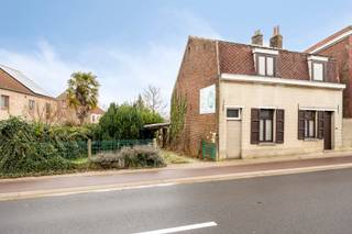 This house, which is to be demolished, is located in a favorable location along Itterbeeksebaan on a plot with interesting development potential...