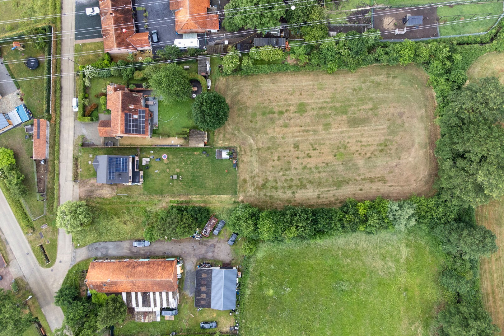 Bouwgrond voor open bebouwing met achterliggend weiland op 4.581 m² in Olmen - foto 5