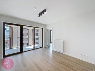 Dit moderne éénslaapkamerappartement op de 4de verdieping heeft een bewoonbare oppervlakte van ± 65 m² en een terras van ± 7 m². De...