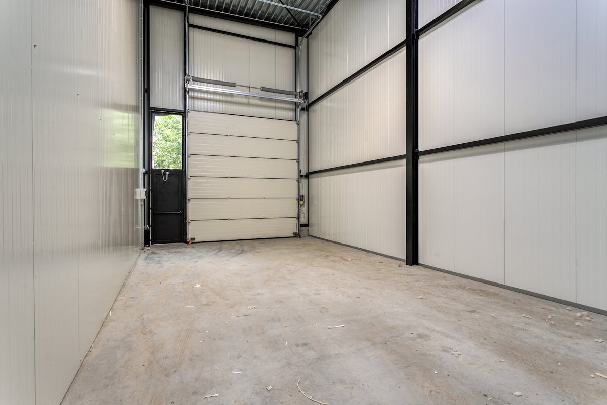 Nieuwbouwmagazijn van ca. 72 m² met kantoor in Wevelgem - foto 2