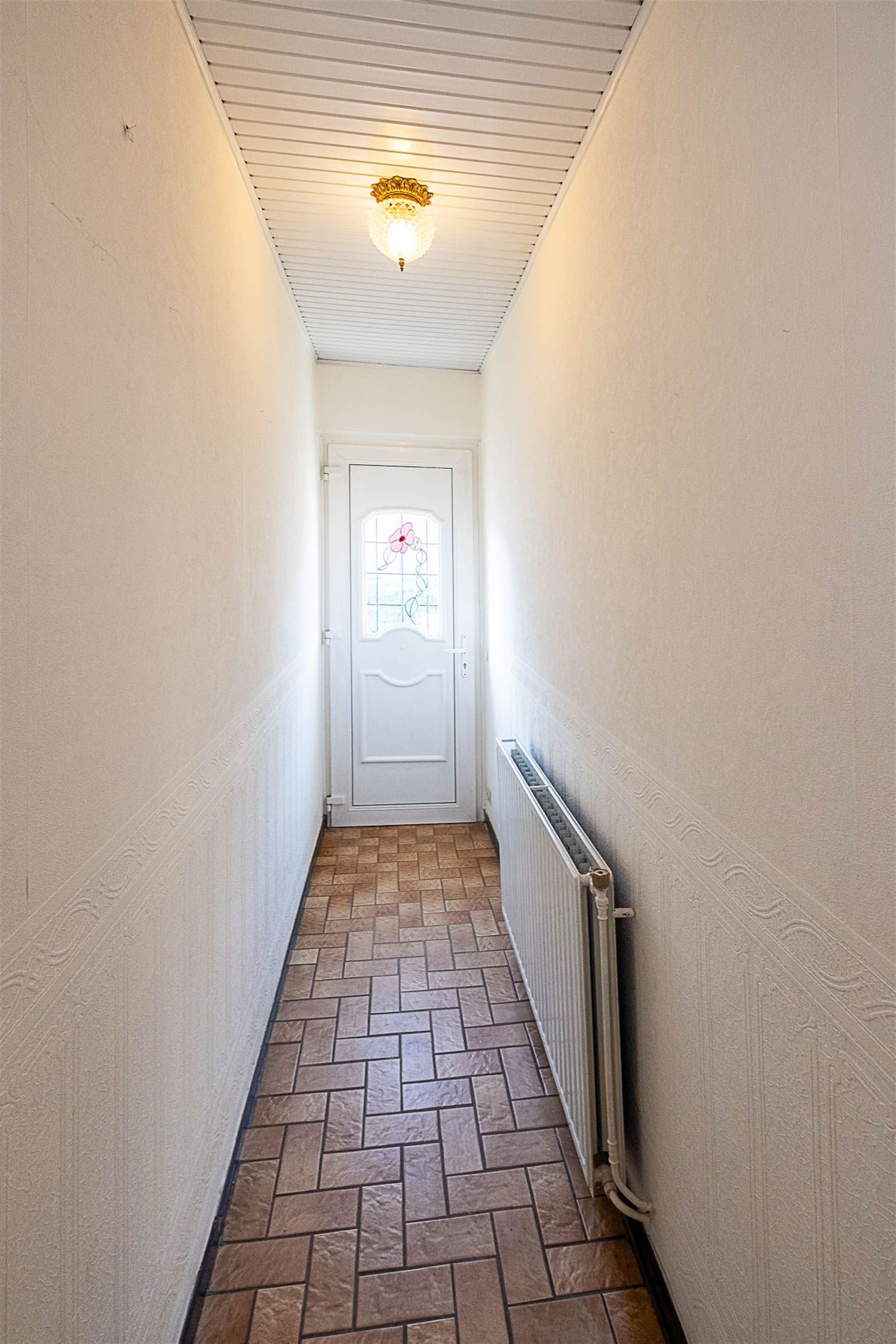 Te renoveren, charmante eengezinswoning met 2 slaapkamers en tuin - foto 4