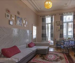 <p><span>immo Talenco sells at Zinnikstraat 10 – 1000 Brussels this spacious yield property, largely to be renovated, with a useful area of ± 300 m², located on a plot of land of ± 99 ca. This property in neoclassical style offers a lot of potential and is conveniently located near public transport and the city center, near the Place Anneessens, Place Fontainas, the Stock Exchange and the Grand Place. (connection between M. Lemonnierlaan and Anderlechtsesteenweg). The ground floor commercial space, the studio and the 4 apartments </span><span>are offered in totality.</span><span> All entities are currently rented. Attractive investment opportunity!</span></p><p><span> </span></p><p><span>Layout:</span></p><p><span>Ground floor:</span><span><br />A</span><span>common entrance hall with a stairwell </span><span>giving access to the basement and apartments above.</span><span> Common basement (fully sub-basement) with a technical room (counters) of ± 16.6 m² and several storage rooms (± 47 m²).</span></p><p><span> </span></p><p><span>Commercial ground floor of ± 70 m², currently rented as an apartment. Consisting of a multipurpose room, kitchen, shower room with shower, sink and toilet. Separate entrance.</span></p><p><span>Currently rented since 01/03/2026 at € 860.00 / month.</span></p><p><span> </span></p><p><span>Mezzanine:</span></p><p><span>A studio of ± 28 m² with a living space of ± 20 m² and a kitchen, shower and wc of ± 5.5 m². Currently rented since 01/04/2025 at € 305.00 / month.</span></p><p><span> </span></p><p><span>Second floor:</span></p><p><span>An apartment to be renovated of 49 m² with 1 bedroom (13 m²), shower room to be renovated with shower, wc and 1 washbasin. (3 m²). A kitchen to be renovated (6.5 m²) and spacious living room (16.8 m²). Individual gas heating (condensing boiler). Currently rented at € 715.00 / month.</span></p><p><span> </span></p><p><span>Second floor:</span></p><p><span>An apartment to be refreshed of ± 49 m² with a shower room to be renovated with shower, toilet and 1 sink. (2,7 m²). Kitchen to be renewed ( ± 6.5 m²) and spacious living space (33.7 m²). Currently rented since 2024 at € 580.50 / month.</span></p><p><span> </span></p><p><span>Third floor:</span></p><p><span>An apartment of ± 49 m² with a shower room to be renovated with shower, toilet and 1 washbasin. (2,7 m²). Kitchen to be renewed ( ± 6,5 m²) and spacious living space (33,7 m²). Currently rented since 01/07/2022 at € 677,50 / month.</span></p><p><span> </span></p><p><span>Fourth floor:</span></p><p><span>A duplex apartment to be refreshed with an entrance hall ( 4,7 m²), a shower room to be renovated with shower and wc. (1,7 m²). A spacious kitchen (9,5 m²) and 2 bedrooms. ( 18 m² and 11,5 m²). Spacious attic room of ± 16 m². Currently rented since 01/06/2024 at € 745.00 / month.</span></p><p><span> </span></p><p><span>Total rental income: € 3883,00/month</span></p><p><span> </span></p><p><span>General features:</span></p><p><span>Cadastral data: </span></p><p><span>21810 AFD 10 Section: L 2056/00K000 P0000</span></p><p><span>0 are 99 ca</span></p><p><span>K.I.: € 1.907,00 Year of construction: ± 1930</span></p><p><span>Located in residential area</span></p><p><span>Street width: ± 5.75 m</span></p><p><span> </span></p><p><span>Characteristics:</span></p><p><span>Total living area: ± 300 m²</span></p><p><span>Solid wooden intermediate floors </span></p><p><span>Heating: individual central heating natural gas condensing boiler</span></p><p><span>Individual counters</span></p><p><span>Roofing: flat roof and gable roof with tiles</span></p><p><span>External joinery: partly single, partly double glazing PVC and wood</span></p><p><span>EPC trade ground floor: 265 kWh/m²/year; – Label E- - UC 20251211-0000737273-01-8</span></p><p><span>EPC apartment mezzanine: 1054 kWh/m²/year ; - Label G – UC 20251211-0000737276-01-1</span></p><p><span>EPC apartment</span><span><sup>1st</sup></span><span> floor: 286 kWh/m²/year; – Label F - UC 20251211-0000737277-01-9</span></p><p><span>EPC apartment</span><span><sup>2nd</sup></span><span> floor: 329 kWh/m²/year; – Label F - UC 20251211-0000737274-01-6</span></p><p><span>EPC apartment</span><span><sup>3rd</sup></span><span> floor: 338 kWh/m²/year; - Label F – UC 20251211-0000737278-01-7</span></p><p><span>EPC duplex</span><span><sup>4th</sup></span><span></span><span> floor: 781 kWh/m²/year; - Label F – UC 20251211-0000737275-01-3</span></p><p><span>Electrical inspection: not AREI compliant </span></p><p><span> </span></p><p><span>Visits:</span><span> after appointment with the real estate office</span></p><p><span>Contact person : Jean Robyns GSM : 0474/01.10.50 – </span><span><span>jean@immotalenco.com</span></span><span> </span></p><p><span>E-mail : </span><span><span>info@immotalenco.com</span></span><span> - </span><span><span>www.immotalenco.com</span></span></p><p><span> </span></p>