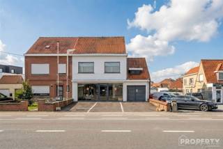 This versatile commercial property with residential offers an excellent opportunity for those who want to combine living and working in a visible and easily accessible location.Location:Located along the Brugsesteenweg, this property enjoys excellent visibility and a smooth connection to surrounding municipalities and major approach roads. Thanks to its central location, stores, schools and public transport are in the vicinity.Layout:On the ground floor there is the commercial property with an adjoining practical basement area and a private garage. There are also several parking spaces in front of the building, which provides additional comfort for customers.The first floor apartment comprises a spacious and bright living area with open kitchen, which opens onto a pleasant and spacious terrace. Furthermore, the apartment has two full bedrooms, a bathroom with shower and a spacious attic space that offers numerous possibilities.For more information or a visit call 056 96 08 00 or email info@property-vastgoed.be