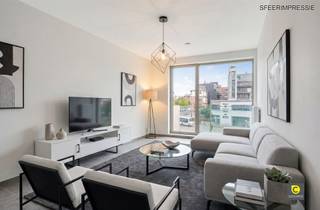 Instapklaar 1-slaapkamerappartement met terras op topligging aan het EilandjeOp een absolute toplocatie aan het Kempisch Dok, in de recente...