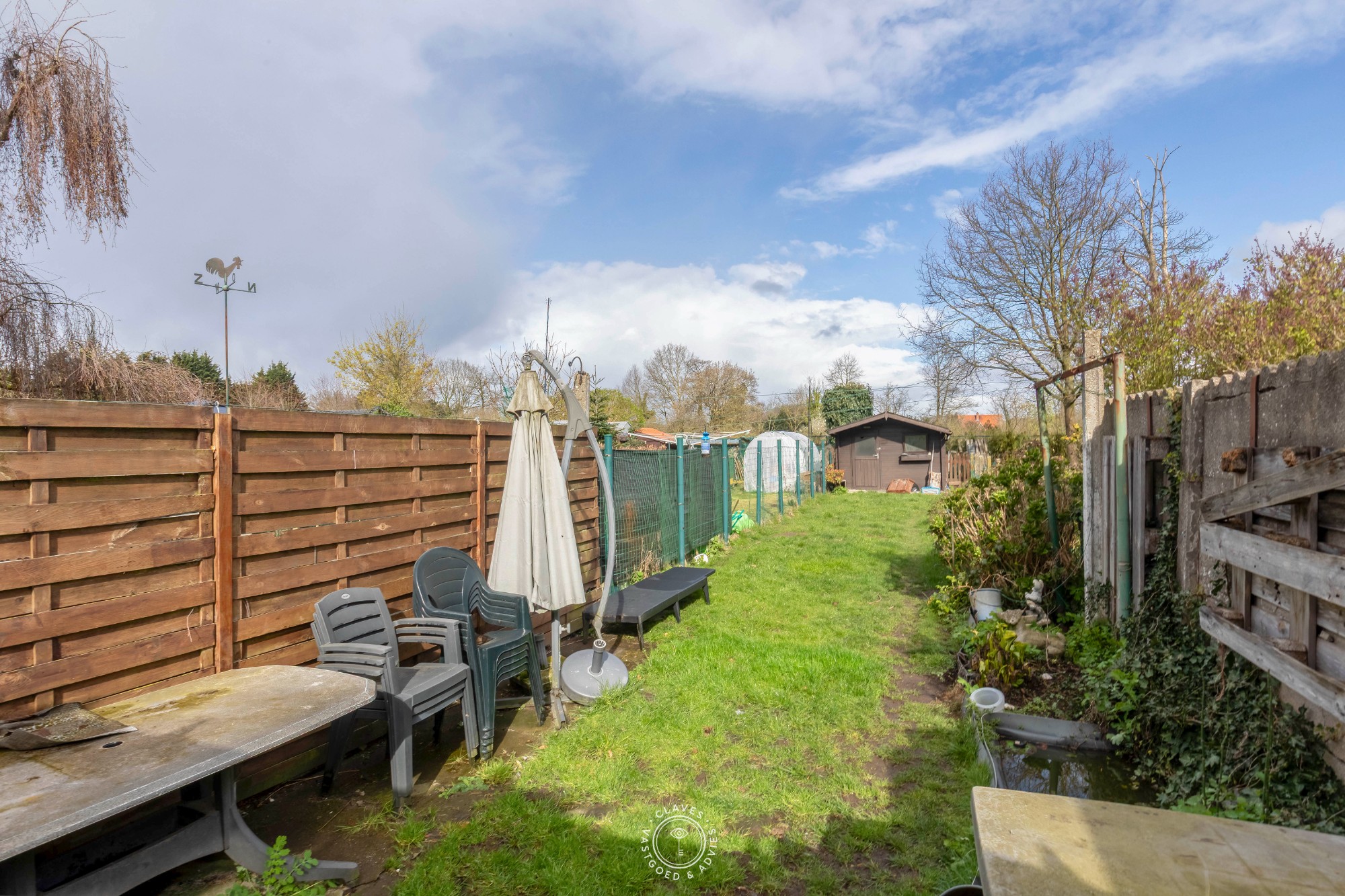 Op te frissen woning met fijne tuin - foto 2