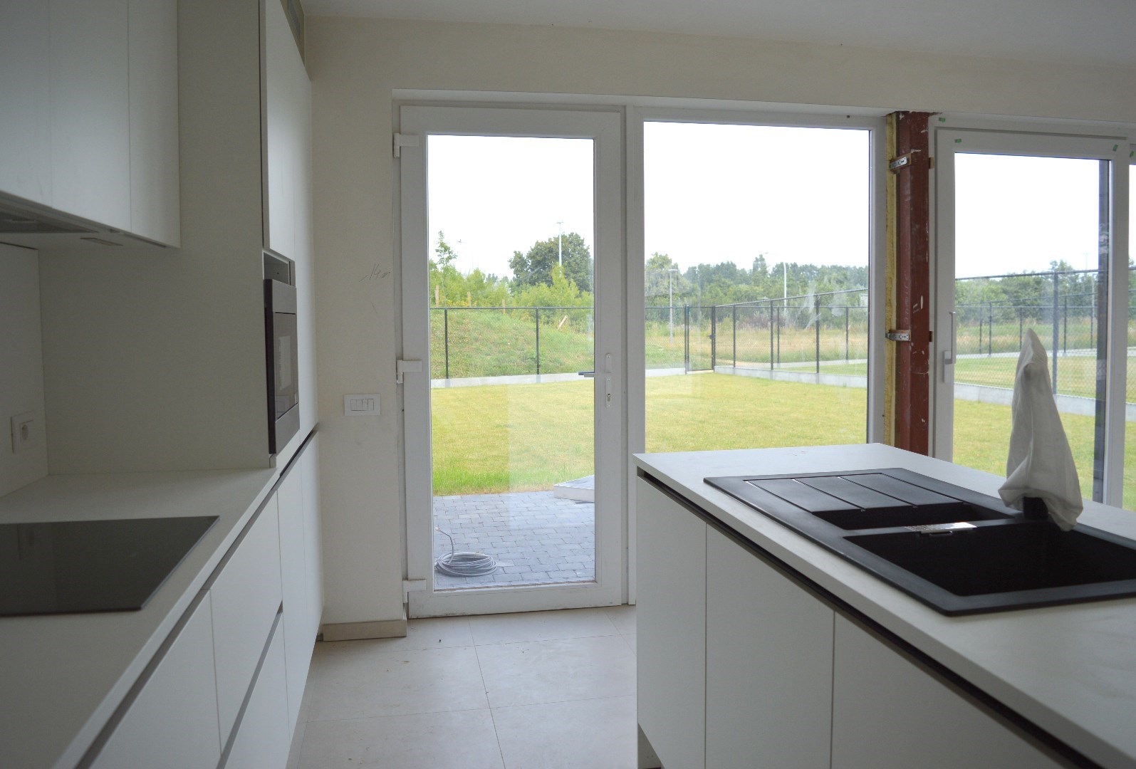Instapklare woning met 3 slaapkamers en carport in kindvriendelijke ligging te Heule - foto 5