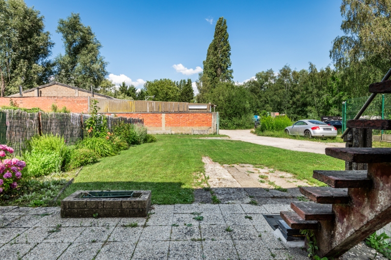 Centraal gelegen te renoveren woning met 4 SLK & mooie tuin - foto 4