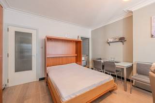 From the terrace, you can enjoy a beautiful side sea view. The kitchen is equipped with cupboard space, fridge and stove. The bright studio has an excellent location, within walking distance of the new Casino and with a pleasant view of the hinterland. The bathroom has a shower, toilet and sink with closet space. This is an ideal second home in Middelkerke!Layout: - Entrance hall- Bright living space with access to a terrace with side sea view- Kitchen- Bathroom with sink, shower and toiletAdvantages: - Location on the Zeedijk, within walking distance of Casino- Pleasant terrace- Bright living space- Compliant electrical inspection- Roof already renewed- Façade already renewed- Gas heating