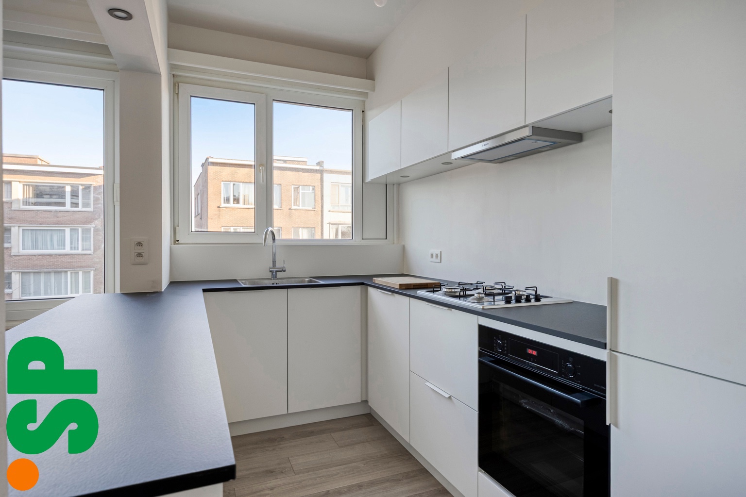 Volledig vernieuwd app met 2 slpks, terras en garage te koop - foto 5