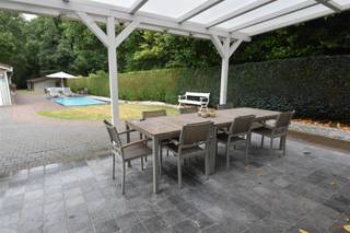 Nieuw bij Animo Vastgoed!!Charmante gezinswoning met verwarmd zwembad, poolhouse en praktijkruimte op toplocatie op de Herebaan-West te...