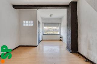 Te renoveren woning met twee slaapkamers en veel potentieel. <br /><br />Indeling van de woning:<br />inkomhal, leefruimte met aansluitend de keuken, een tussen (was-)ruimte en een gelijkvloers badkamer. Op de eerste verdieping hebben we twee slaapkamers en eventuele toegang tot de opbergzolder.<br />Buiten treffen we eerst een grote koer met toegang tot het bijgebouw en achteraan een groene en zeer rustige tuin.<br /><br />Deze woning biedt tal van mogelijkheden: Voorbeeld:<br />- Gelijkvloers: max. 17 m diep met kroonlijst max. 3.50 m; <br />- Verdieping: max. 13 m met kroonlijst max. 6.50 m; <br />- Dak: plat: aan te sluiten bij nr. 44, of hellend over een dakbasis van 9m diep.<br /><br />Bijkomende troeven: <br />- Top locatie; groen en rustig en nét buiten het centrum<br />- Opportuniteitsmogelijkheden <br />- Veel parkeergelegenheid <br /><br />Voor meer informatie of een bezoek ter plaatse, kan u contact opnemen met IMMO SP via 014 59 10 20 of mailen naar info@immosp.be. Benieuwd naar de waarde van uw eigen woning? Vraag vrijblijvend een gratis verkoopanalyse aan – wij helpen u graag verder!