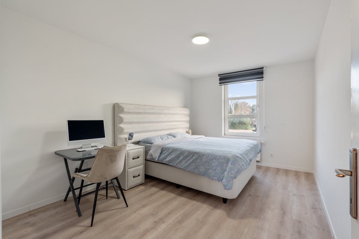 Rendabele opbrengsteigendom met handelspand, magazijn, woonst en 2 appartementen in Genk - foto 5