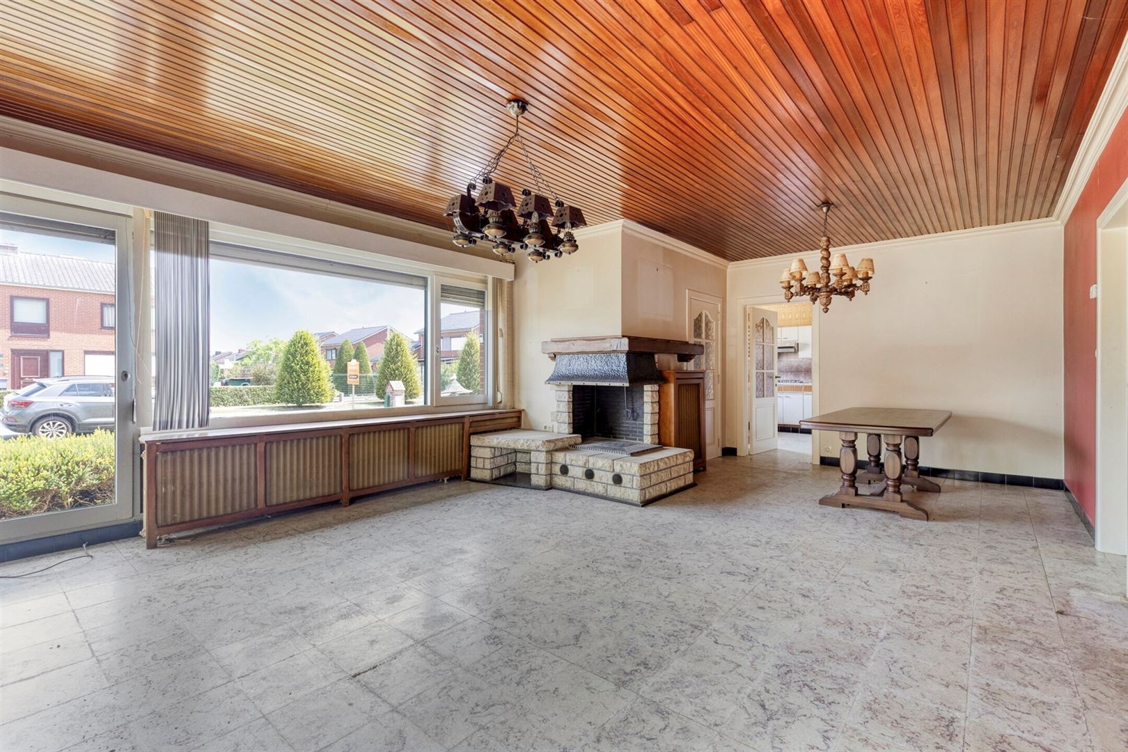 Gelijkvloerse wonen  met zongerichte tuin, te renoveren. - foto 4