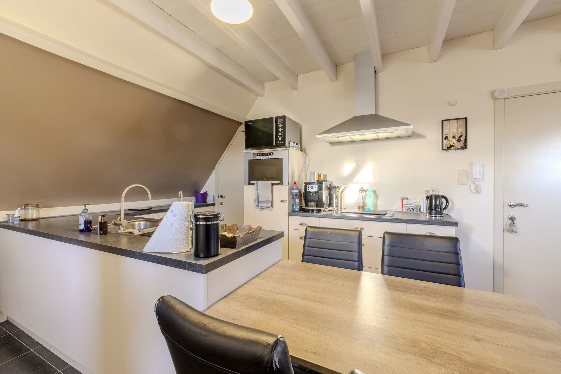 Duplex studio met garagebox op toplocatie - foto 4