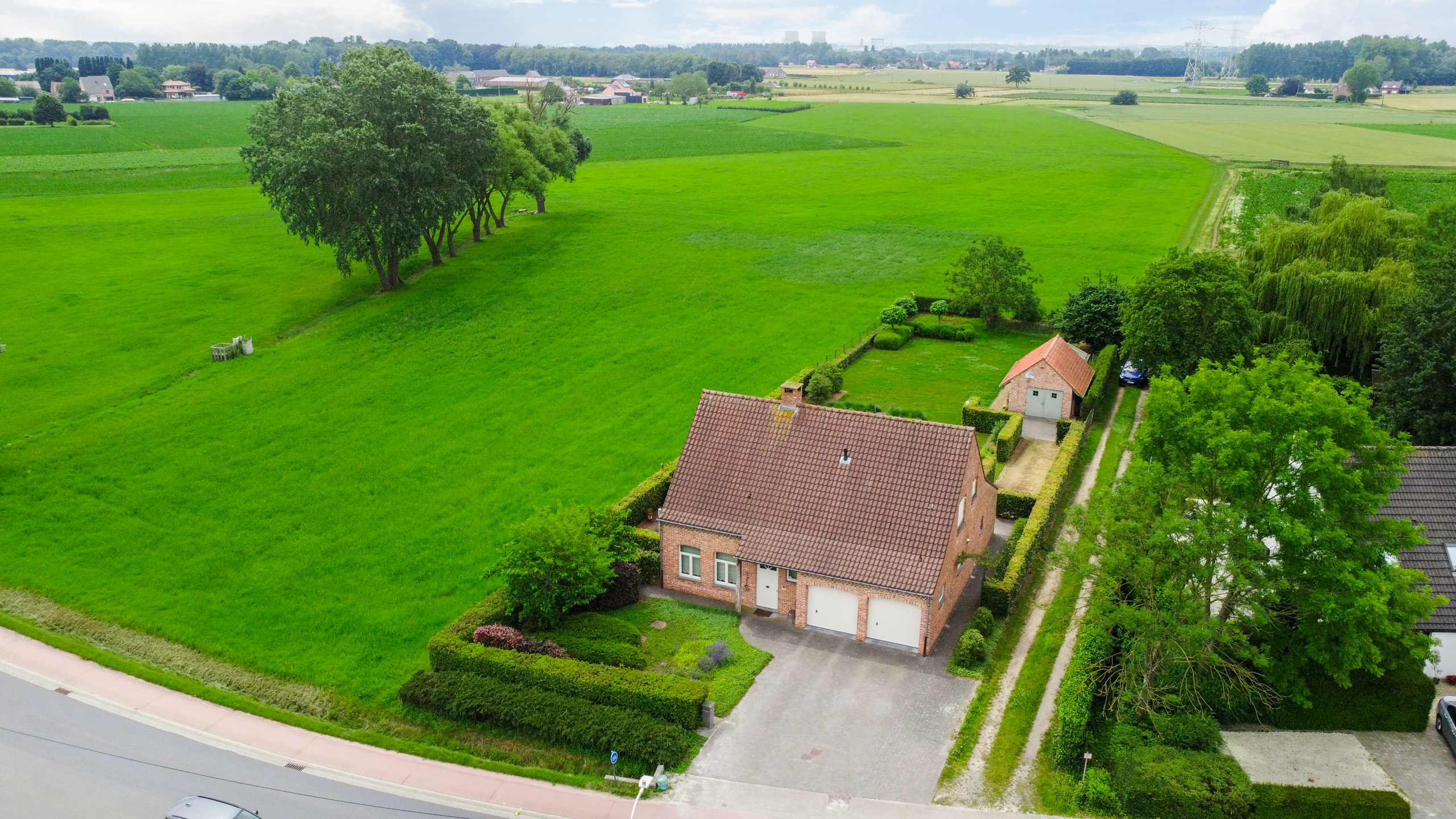 Vrijstaande woning met uniek uitzicht, 4 slaapkamers, zwemvijver en zonnige tuin op 1.649 m² in Zemst