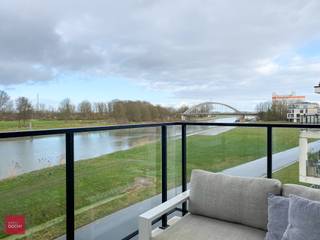Heel mooi appartement met alle modern comfort, bestaande uit een inkomhall, volledig ingerichte keuken met aanpalend groot terras, living met...