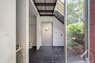 Strakke moderne villa met zwembad op een ruim perceel van 4617 m² gelegen in het rustige Kapellenbos. Omgeven door een prachtig natuurgebied,...