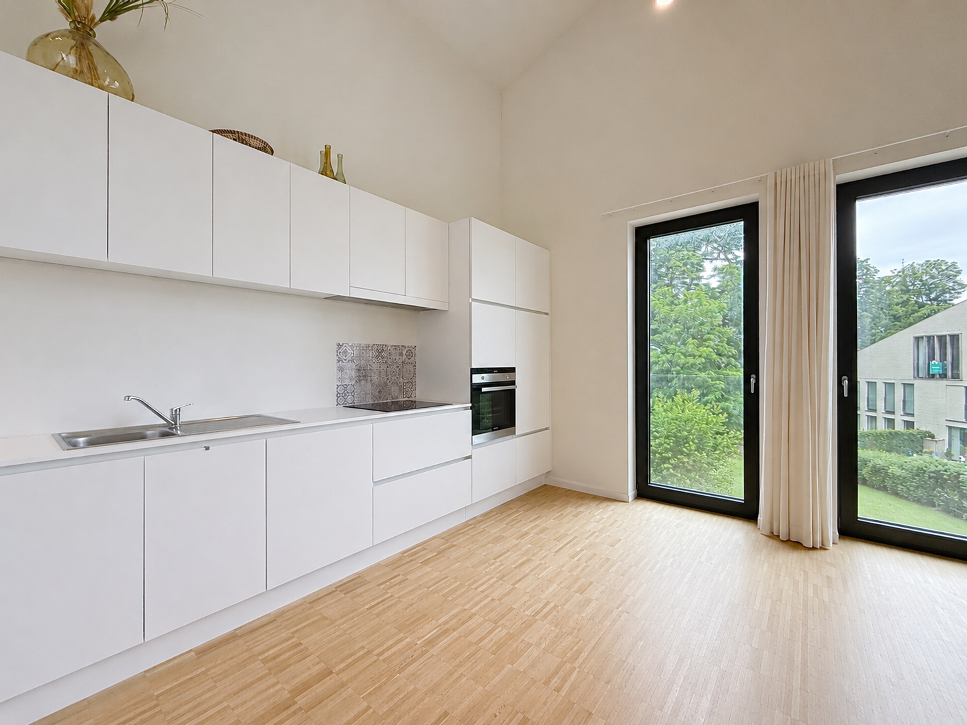 Recent appartement met 2 slaapkamers, terras + staanplaats - foto 5