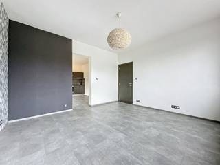 Situé en plein centre du village de Nandrin, We Invest Huy vous propose en location ce charmant duplex.Au rez : hall d’entréeAu 1er : hall - séjour -...