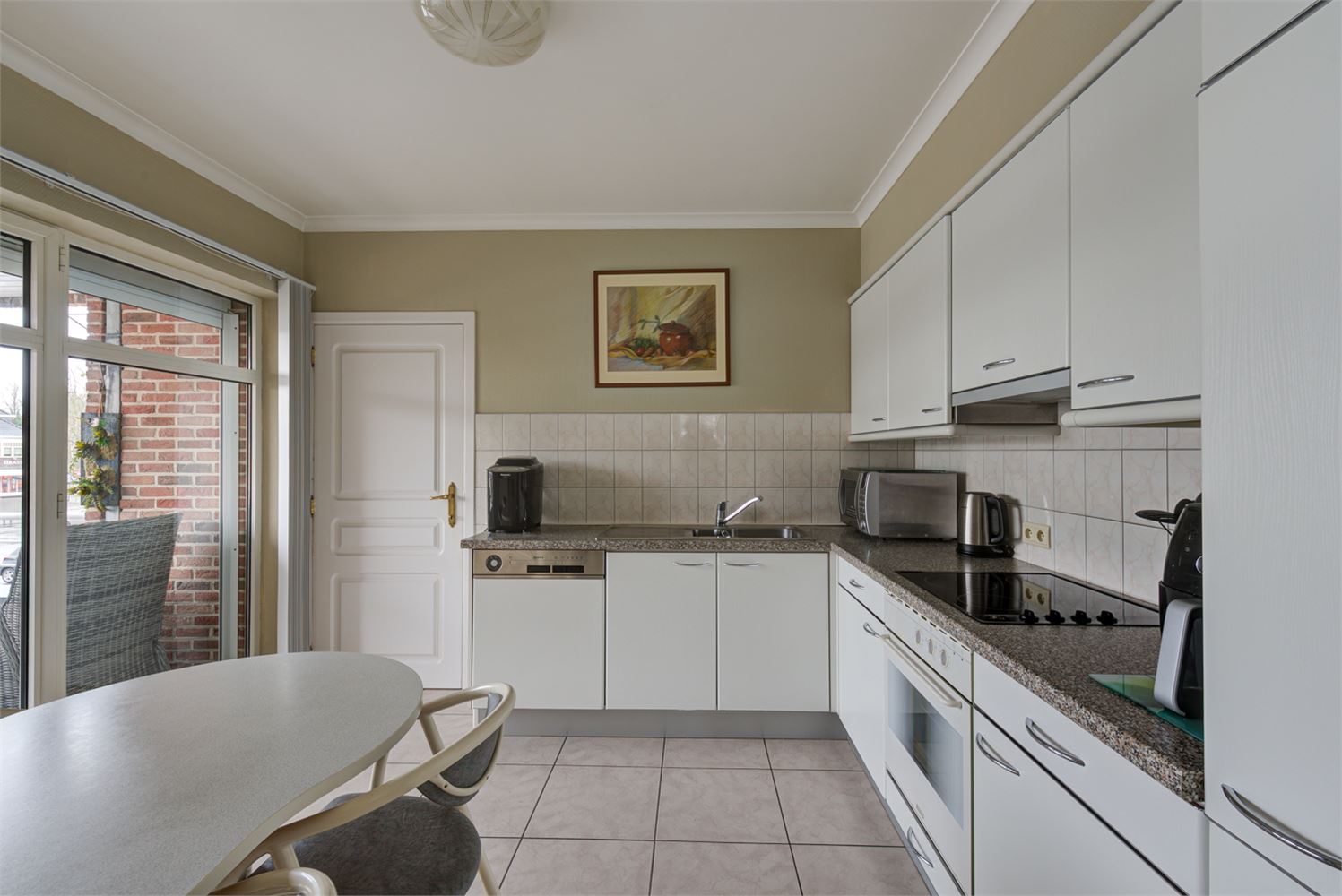 INSTAPKLAAR APPARTEMENT MET 2 SLAAPKAMERS EN GARAGE TE OPGRIMBIE - foto 5