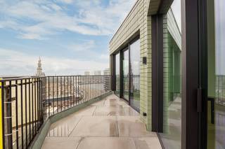 Projet résidentiel de prestige avec vue panoramique sur l'EscautR!VERT, faisant référence à l'imposante rivière De Schelde d'une part et à la façade...