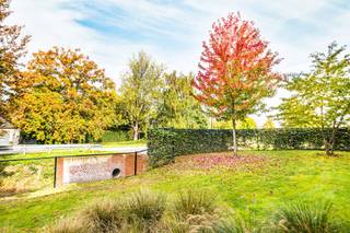 Some places simply feel different. Here, natural light flows freely through an elegant glass partition connecting the hallway and living area...