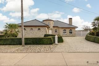 Maison de style espagnol avec dépendance unique à BegijnendijkDans un quartier calme et verdoyant de Begijnendijk se trouve cette charmante maison de...