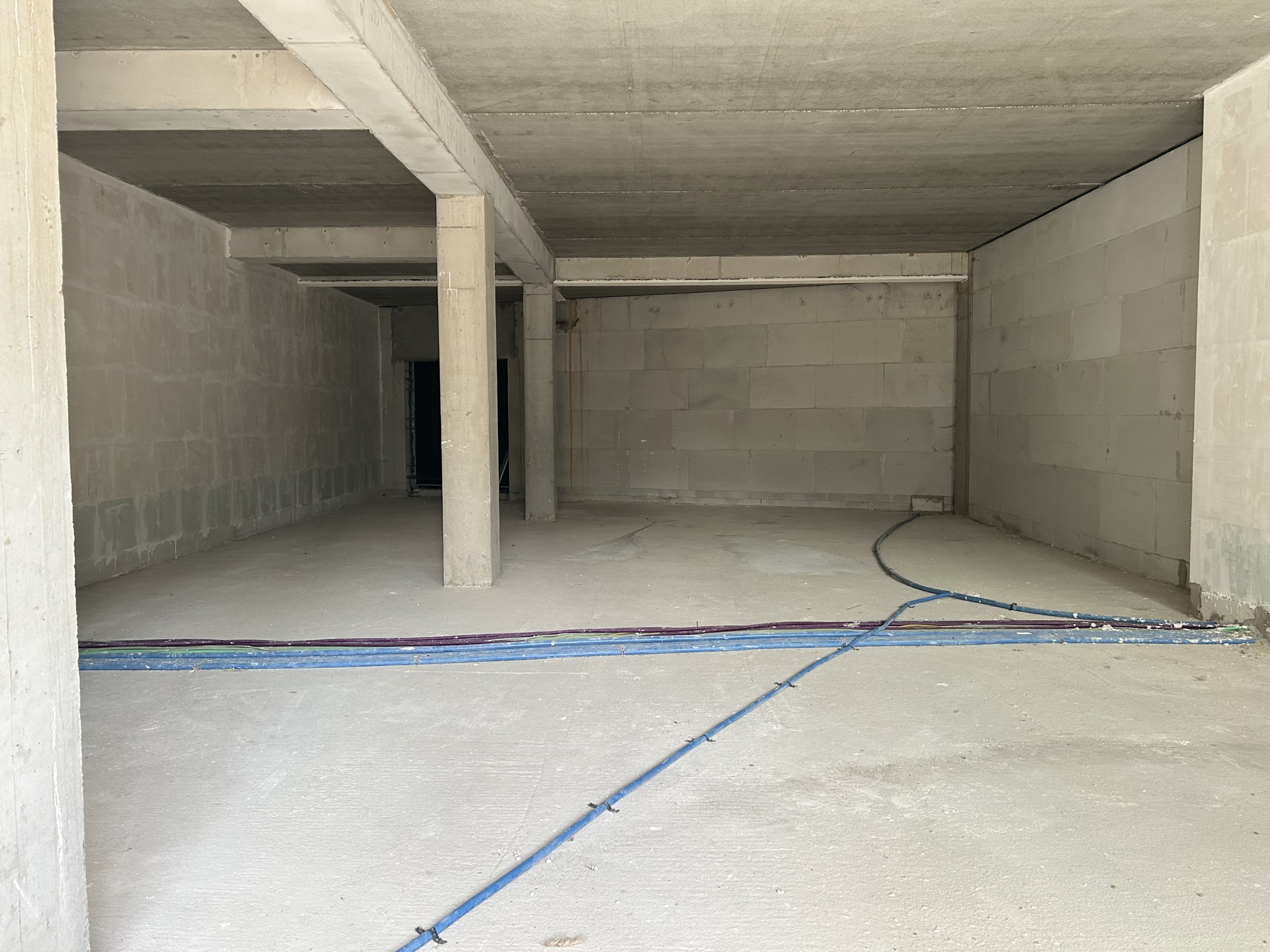 Knap casco handelspand van 155,5 m² in Residentie "De Voogdij" in het centrum van Mol. - foto 5