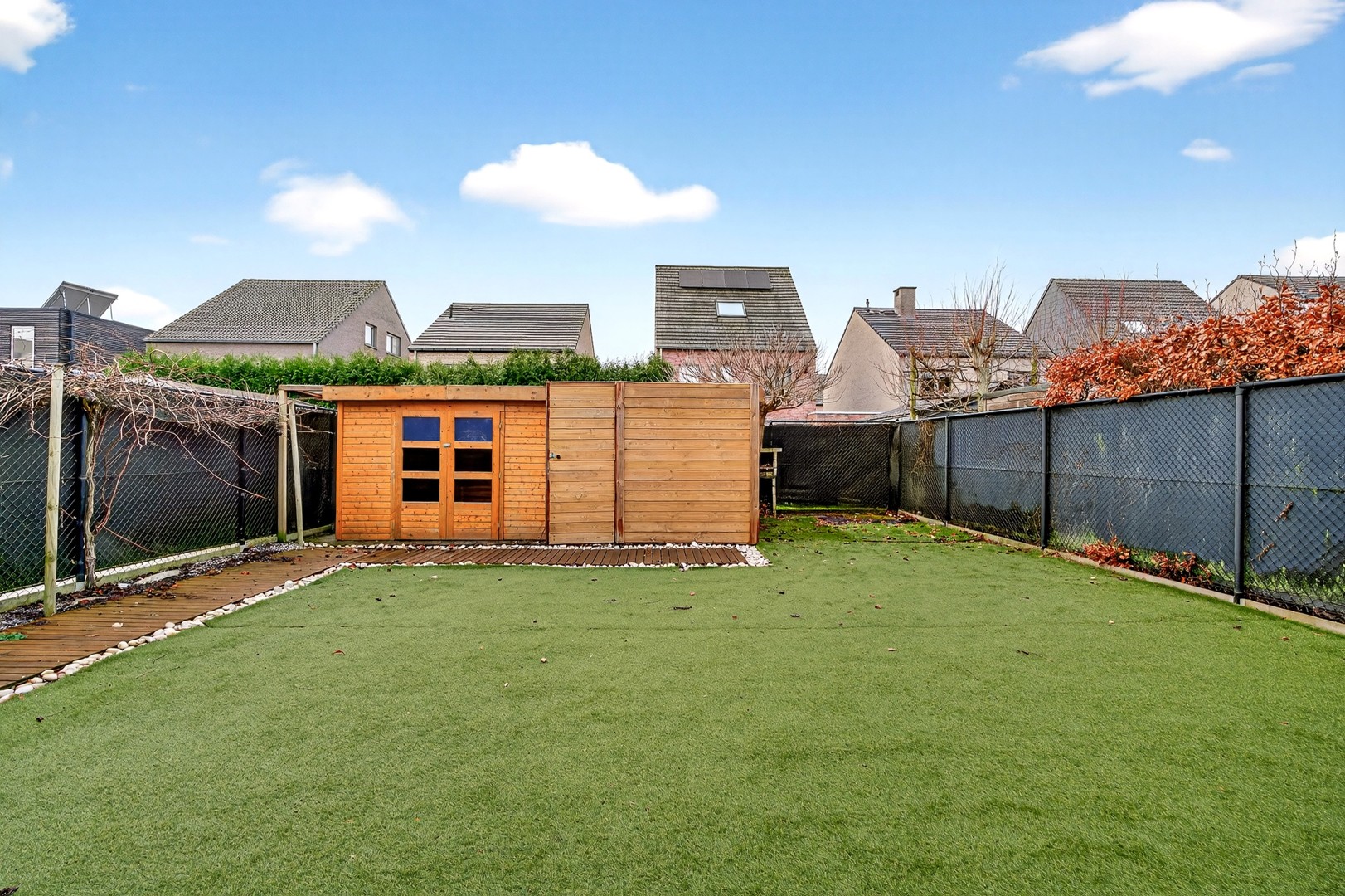 Ruime gezinswoning in rustige woonwijk met tuin en garage - foto 3