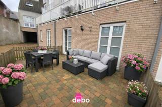 Volledig instapklaar ruim gelijkvloers appartement te Ingooigem (op 500m van Molecule) in een kleine residentie, omvattende o.a. : * Inkomhal *...