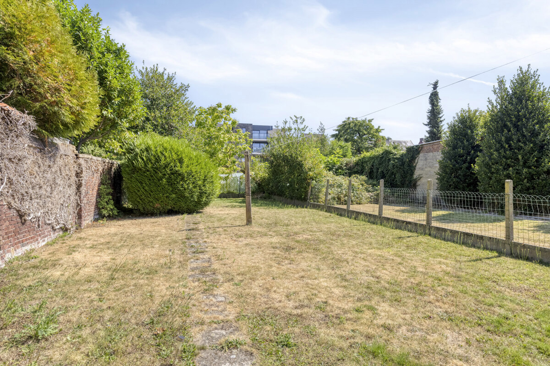 Te renoveren duplex met een enorme tuin in hartje Zottegem - foto 4