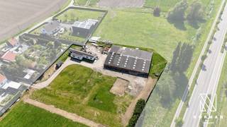 +-8230 m² grond te koop met een goedgekeurde bouwvergunning voor een alleenstaande woning. Aansluitend is er ook een loods.Er is een goedgekeurde...