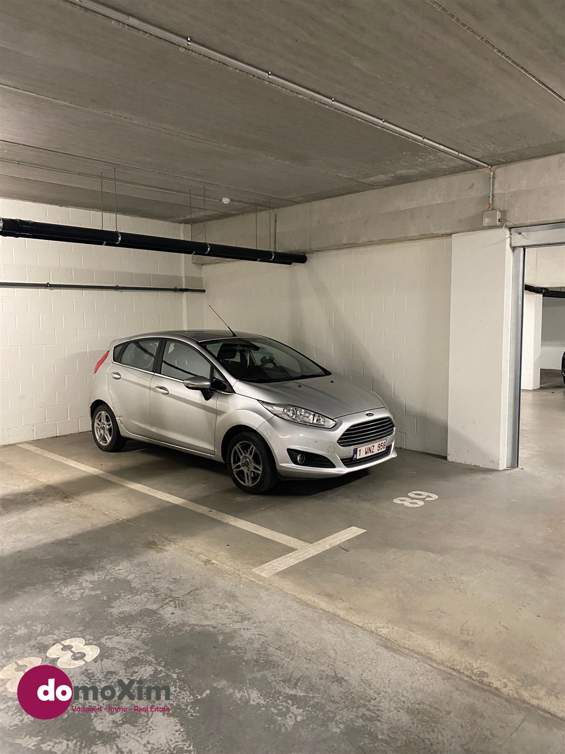 Ondergrondse parkeerplaats gelegen in het centrum van Boortmeerbeek - foto 1