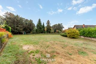 Interesse? Meer informatie op www.SWEVERS.be. - Deze prachtig gelegen bouwgrond in de Steenstraat 4 te Lummen biedt de ideale basis voor...