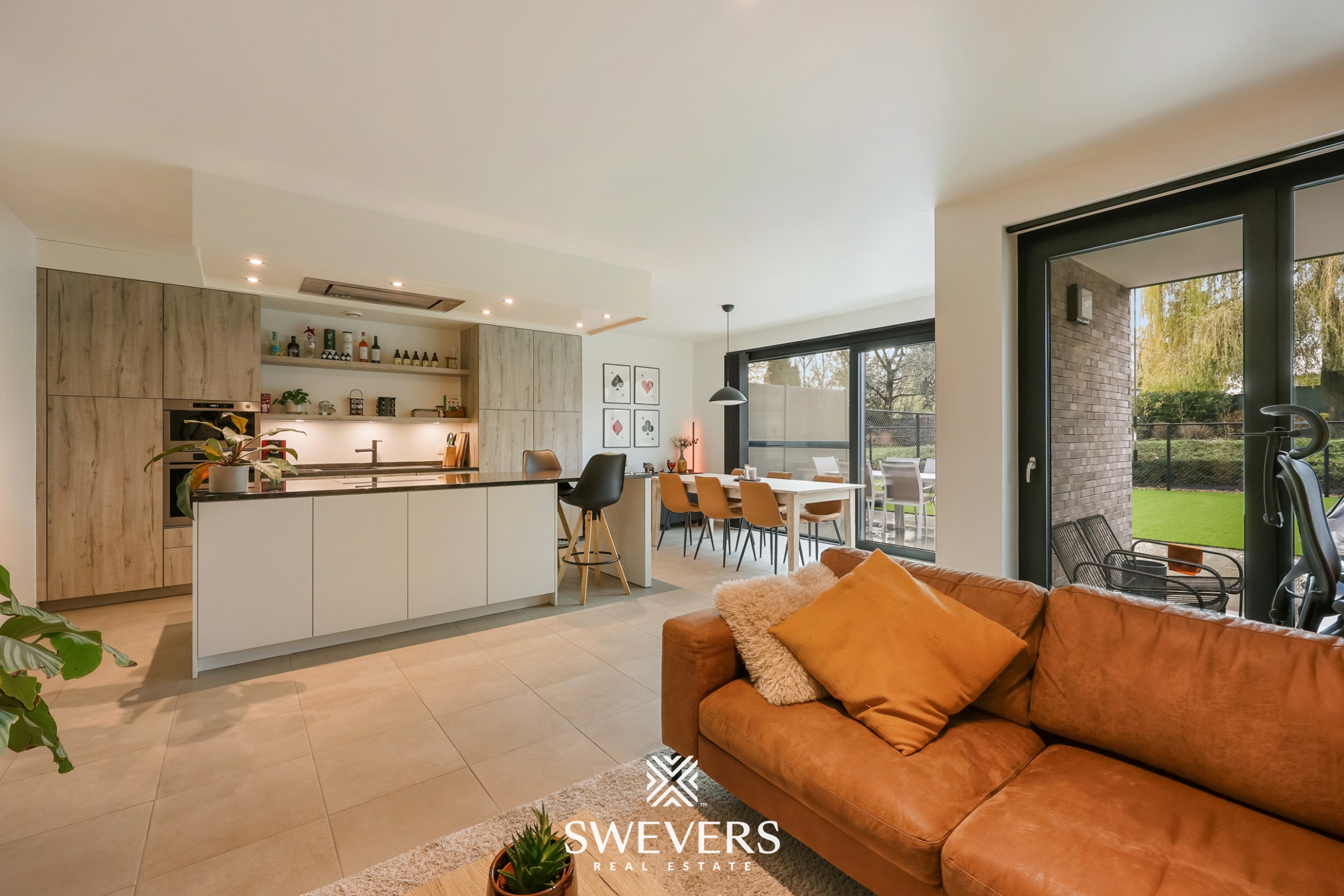 Gelijkvloers appartement met privétuin en dubbele garage - foto 1