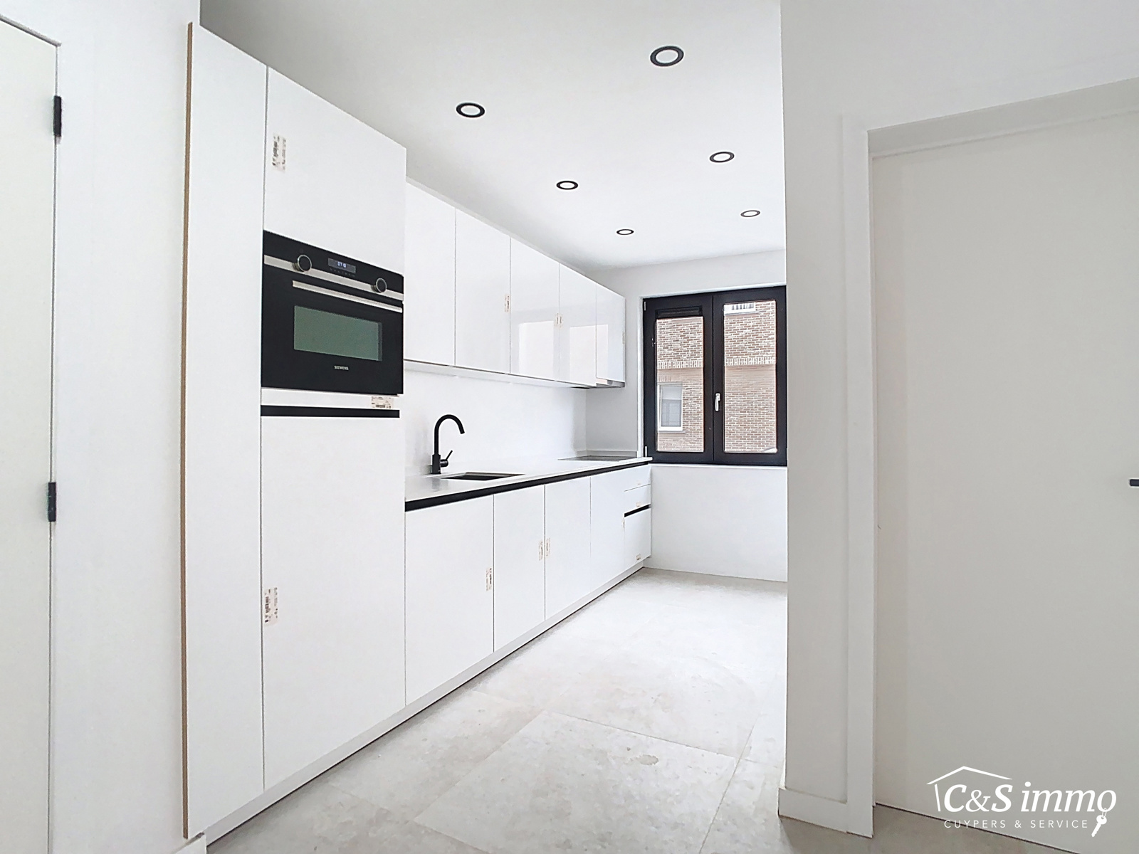 Gelijkvloers gerenoveerd appartement nabij Edegem centrum - foto 5