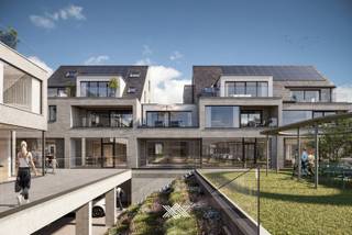 Dit tweeslaapkamer appartement van in totaal 121 m² is gelegen op het tweede en derde verdiep en beschikt op het tweede verdiep over een lichtrijke eet- en leefruimte, een open keuken, een praktische berging, een afzonderlijk toilet en één slaapkamer met een ensuite badkamer uitgerust met een dubbele wastafel en een douche. Op het derde verdiep bevindt zich de tweede slaapkamer en een tweede badkamer uitgerust met een dubbele wastafel, een ligbad, een inloopdouche en een toilet. Daarenboven beschikt dit appartement over twee terrassen, één aan de voorkant en één aan de achterkant met zicht op de binnentuin. De gezamenlijke oppervlakte van de zonnige terrassen bedraagt 28,15 m².<br /><br />Het project onderscheidt haar dankzij het gebruik van efficiënte, vooruitstrevende technieken, waarbij ieder appartement werd voorzien van een eigen geothermische warmtepomp in combinatie met vloerverwarming (én -koeling).  Op het gebied van afwerking biedt Kapellehof hoge standaarden met ruime budgetten voor de keuze van uw vloerafwerking, de sanitaire toestellen en de volledig geïnstalleerde keuken met kwalitatieve inbouwtoestellen.<br /><br />Bij elk appartement hoort tevens een ondergrondse parkeerplaats en een privatieve kelderberging, allen voldoende ruim en vlot toegankelijk.<br /><br />Benieuwd? 09 278 78 79 of guillian@landbergh.be 