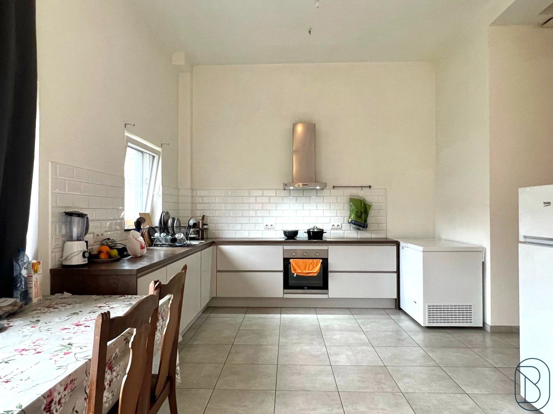 Goedgelegen APPARTEMENT met 2 SLK, TERRAS en TUIN - foto 2