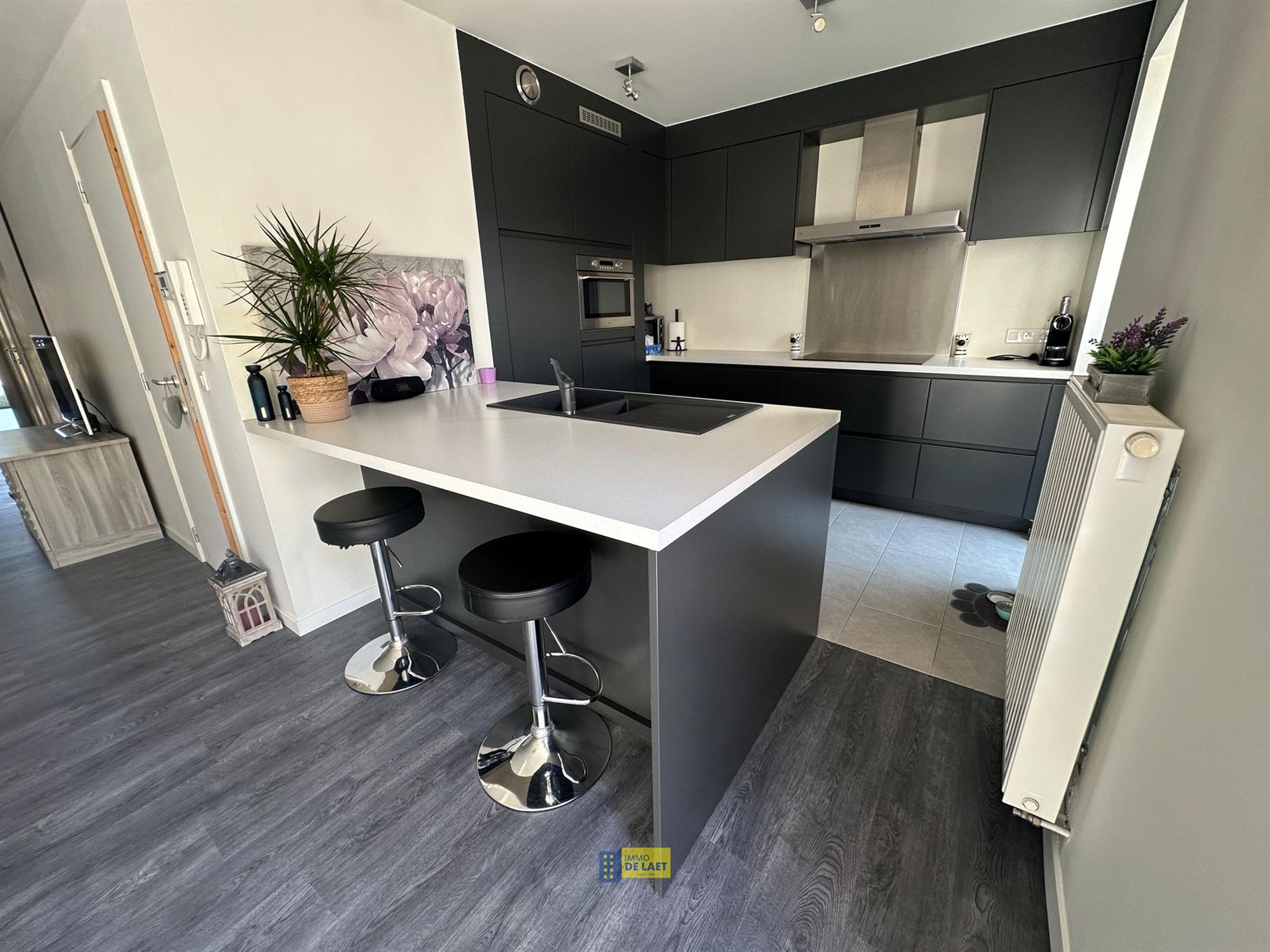 Gelijkvloers appartement met mooie tuin en autostaanplaats - foto 5