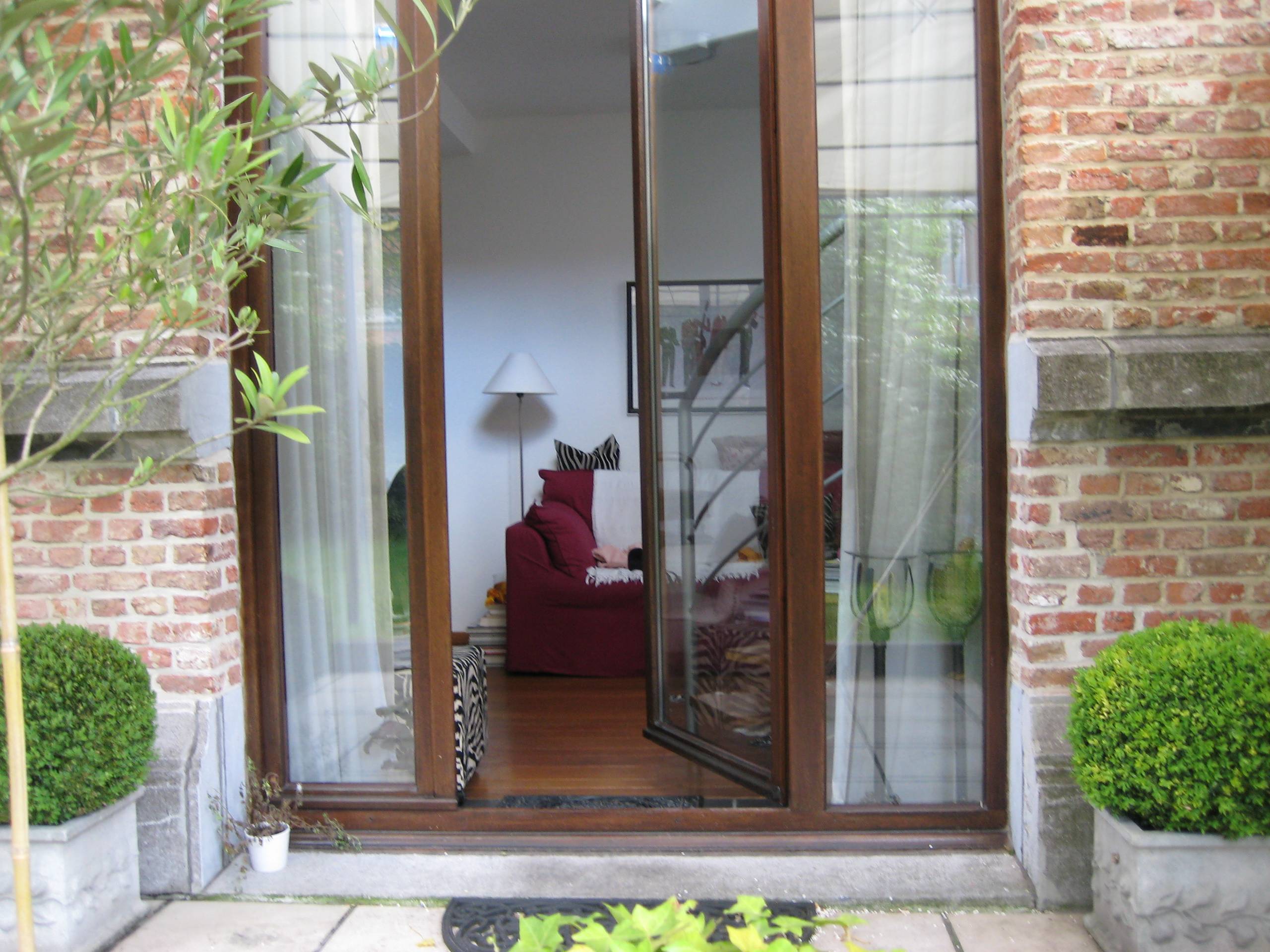 Duplexappartement in Leuven centrum met ruim terras en tuin - foto 2